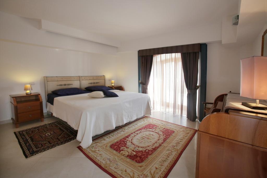 Апартаменти Casa Costa Таорміна Номер фото